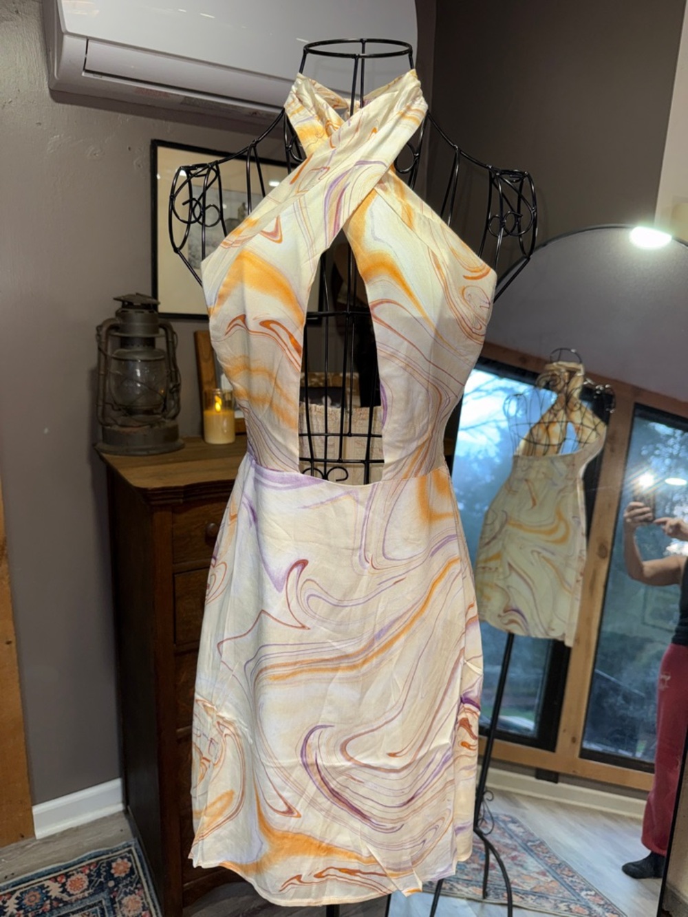 Olivaceous 2Pc. Marble-Print Crisscross Halter Mini Dress with a top.